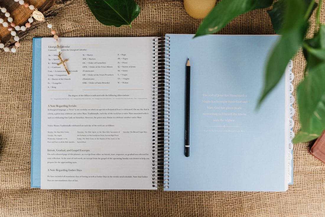 The planner open to a monthly reflection spread
